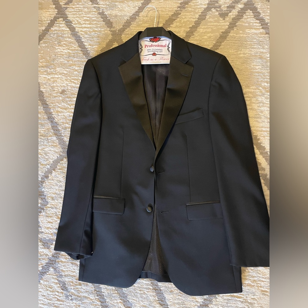 Black Pronto Uomo Tuxedo. Pants are 38 long/32 waist and the jacket is a Medium.